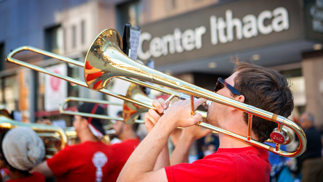 Marching band performs in downtown Ithaca
