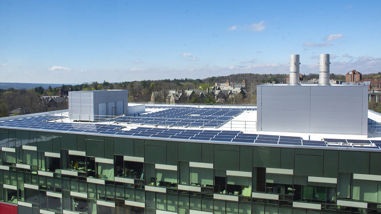 Solar panels on the roof of Martha Van Rensselaer Hall.