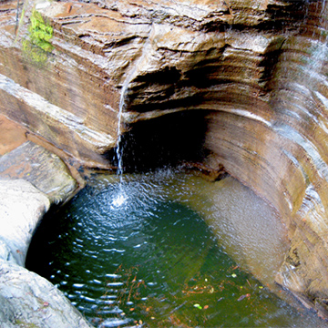 Natural pool at the base of Buttermilk Falls